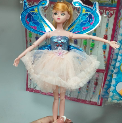 Muñeca con alas de mariposa con  llavero
